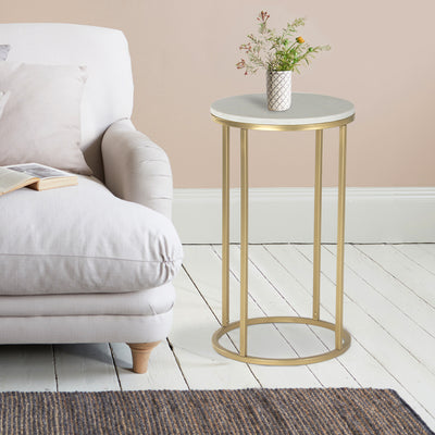 Round side or end table with marble top, supported by metal legs in gold finish