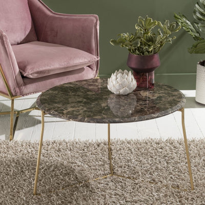 Round coffee table includes a white marble tabletop and mild metal legs in gold finish
