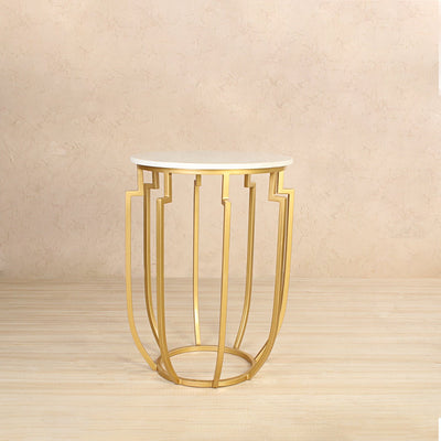 Round side or end table with natural white marble top, supported by metal legs in gold finish