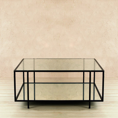 rectangle shape coffee table with two-tiered shelf top with clear glass and bottom with mirror, supported by iron legs and black finish