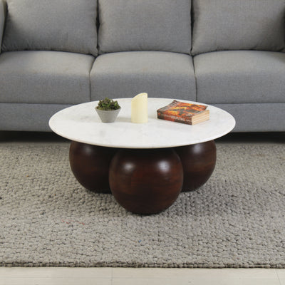 Lifestyle view of griffin marble coffee table with white marble top and dark walnut finish