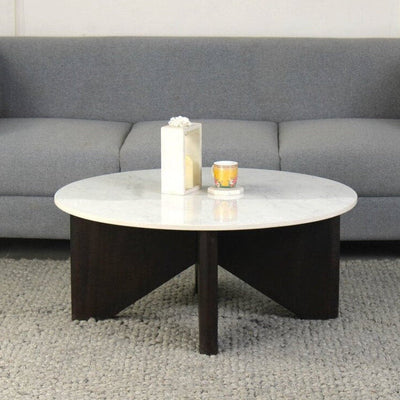 Lifestyle view of linden composite marble coffee table with dark walnut base