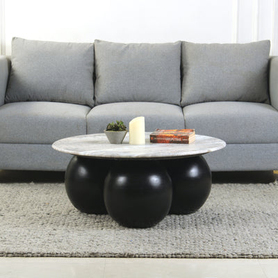 Lifestyle view of roswell marble coffee table with toronto marble top and black base