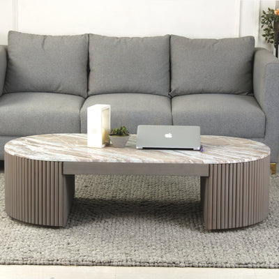 Lifestyle view of roswell marble coffee table with toronto marble top and smoked grey finish