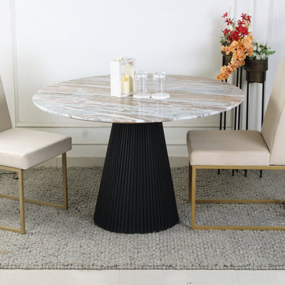 Lifestyle view of solano real marble 4 seater dining table with dark walnut base