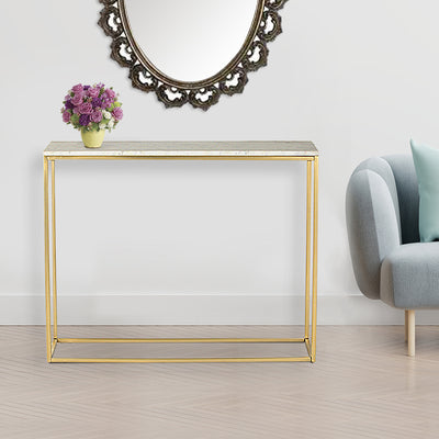 Rectangle glass console table with natural white marble top supported by metal legs in gold finish
