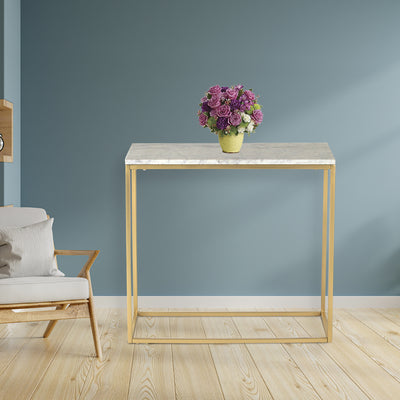 Rectangle side or end table with natural white marble top, supported by iron legs in gold finish