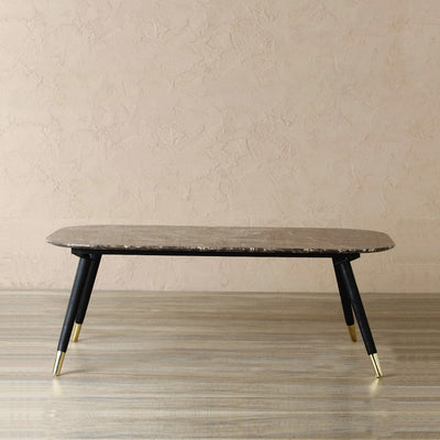 Rectangle coffee table with italian brown marble top supported by mango wood legs with brass cones 