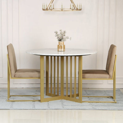 Natural white marble 4 seater round dining table with marble top and metal legs in gold finish 